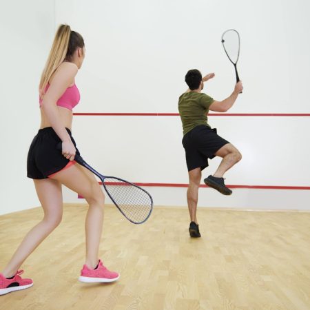 Rear view of couple during the squash game