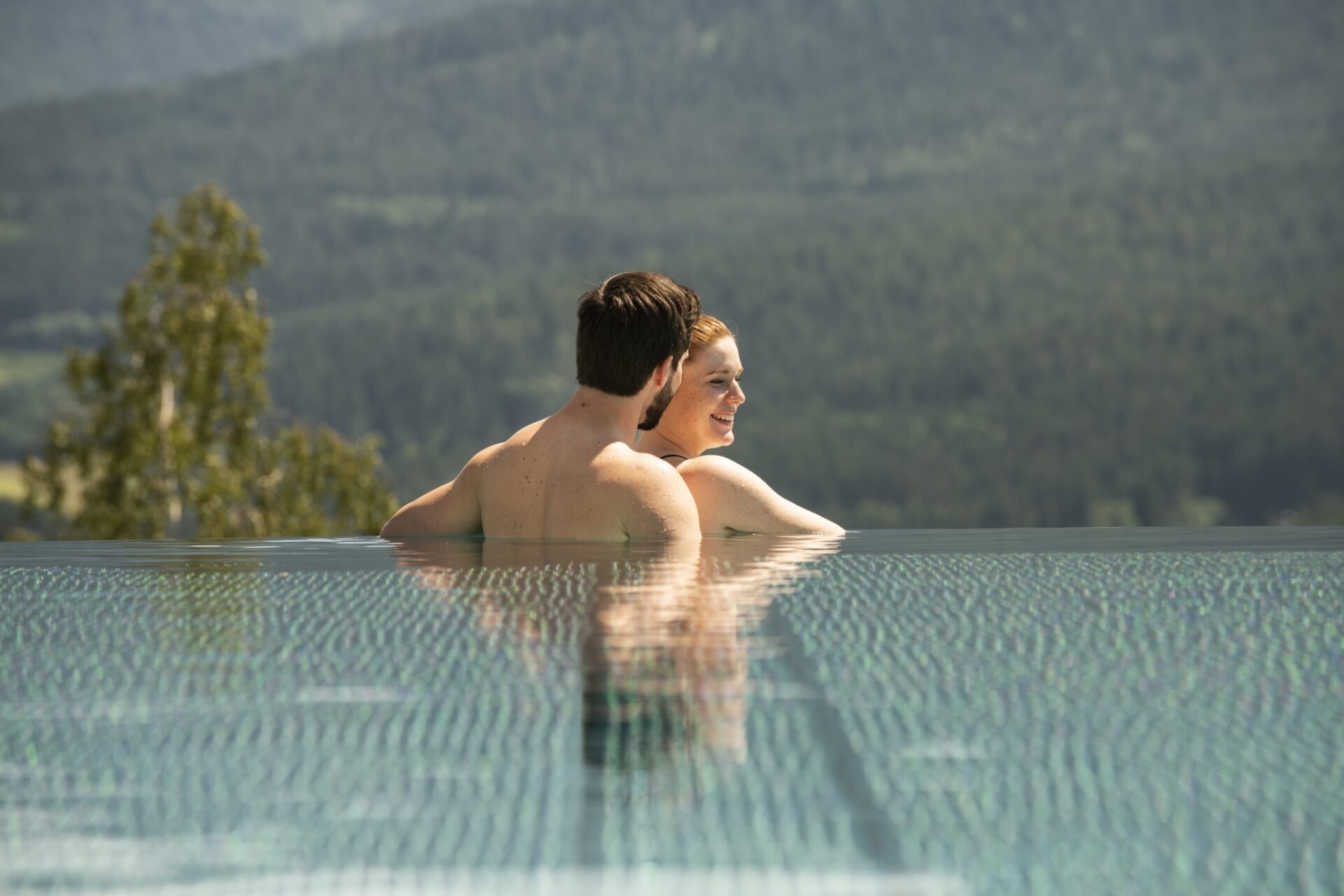 infinity-pool-sommerurlaub-im-bayerischen-wald-hotel-sonnenhof-lam-scaled infinity-pool-sommerurlaub-im-bayerischen-wald-hotel-sonnenhof-lam-scaled